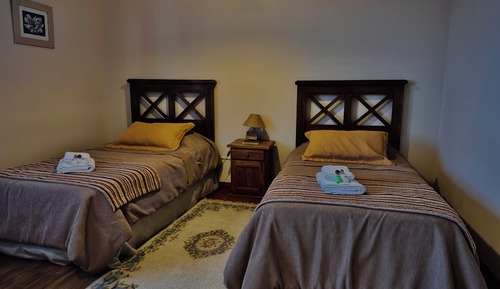 Habitación superior con 1 cama doble o 2 individuales