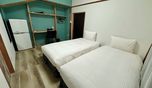 Habitación con 2 camas individuales