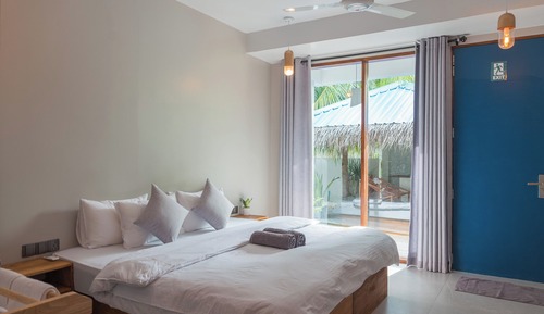 Habitación triple Deluxe, vistas al jardín