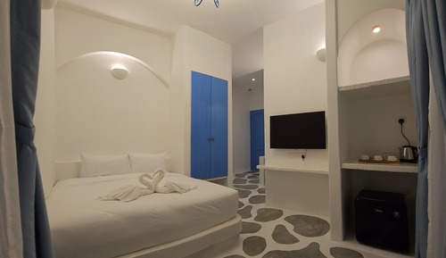 Habitación triple Deluxe, balcón