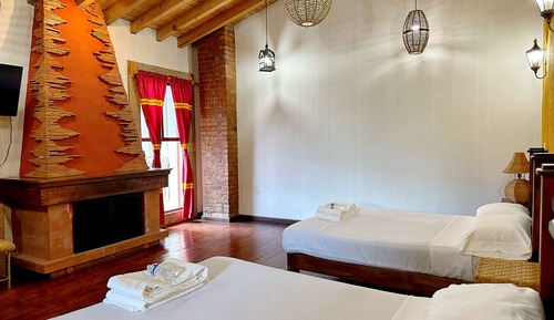 Habitación cuádruple Deluxe, vistas al patio