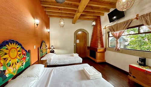 Habitación cuádruple superior, accesible en silla de ruedas, vistas al jardín