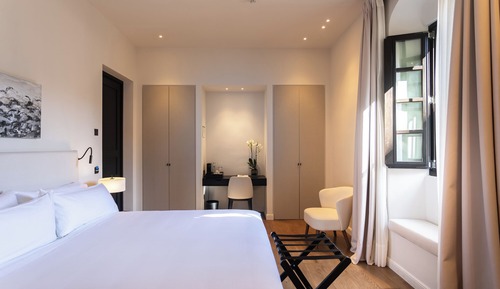 Habitación Deluxe con 1 cama doble o 2 individuales, 1 cama de matrimonio grande, vistas a la ciudad