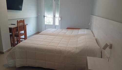 Habitación con 1 cama doble o 2 individuales