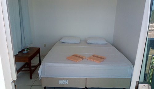 Habitación superior con 2 camas individuales, patio