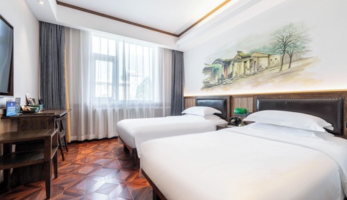 Habitación clásica con 2 camas individuales