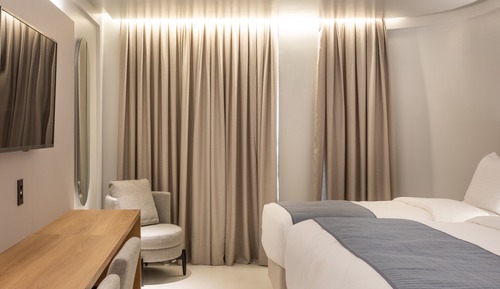 Habitación triple Deluxe, vistas parciales al mar