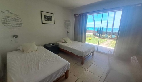 Habitación clásica con 2 camas individuales, balcón, vistas al mar