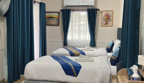 Habitación Deluxe con 2 camas individuales, vistas al jardín