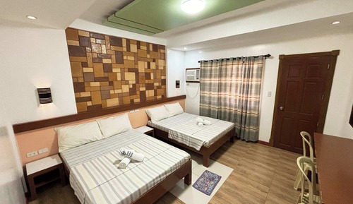 Habitación cuádruple Deluxe