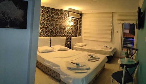 Habitación familiar con 1 cama doble o 2 individuales, vistas a la playa