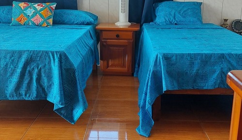 Habitación triple clásica, baño privado, vistas a la laguna (Taina)