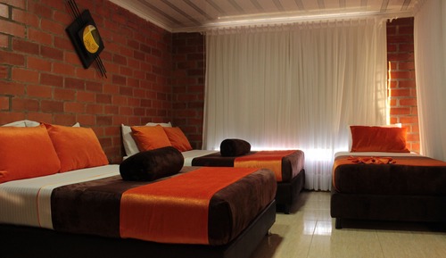 Habitación cuádruple clásica, balcón, vistas al jardín