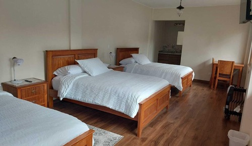 Habitación triple Confort, vistas al jardín