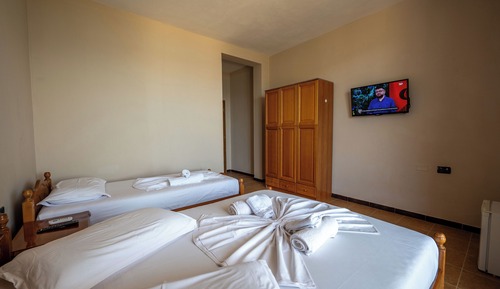 Habitación triple, vistas al mar