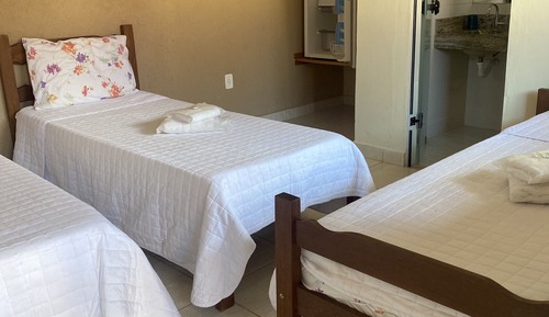 Habitación triple estándar, 3 camas individuales, frigorífico, vistas al jardín