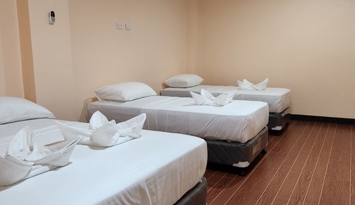 Habitación familiar, varias camas