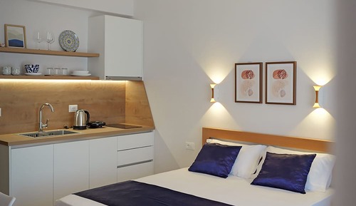 Habitación triple, vistas al mar