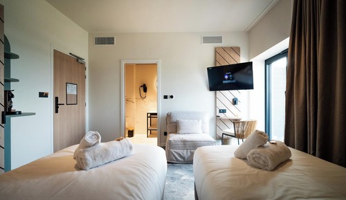 Habitación superior, varias camas