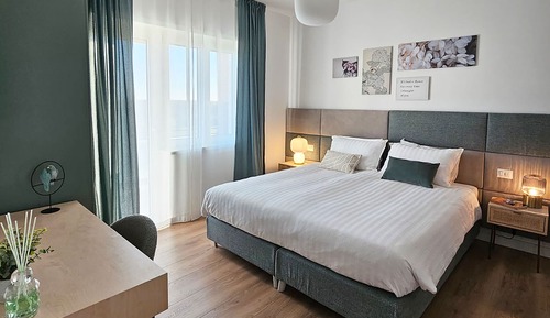 Habitación Deluxe con 1 cama doble o 2 individuales