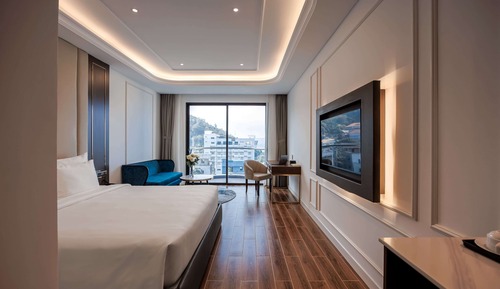 Habitación Deluxe doble, 1 cama de matrimonio grande, vistas parciales al mar