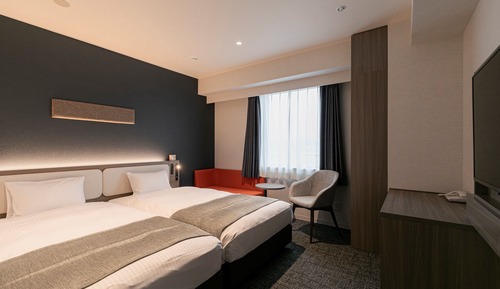Habitación básica con 2 camas individuales