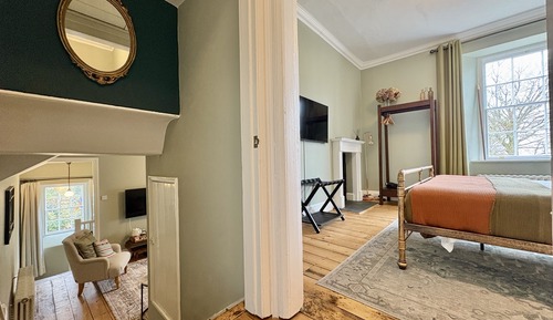 Suite superior, baño privado, vistas al jardín