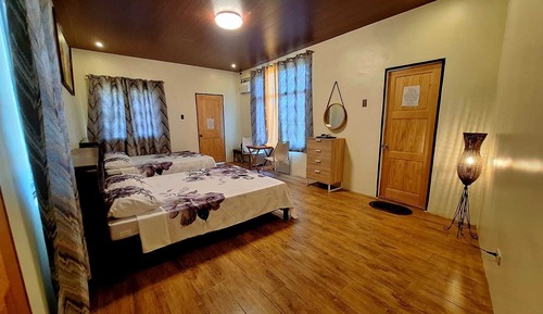 Habitación Signature con 1 cama doble o 2 individuales