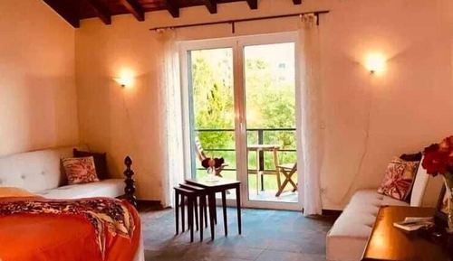 Habitación de lujo con 1 cama doble o 2 individuales, vistas al jardín