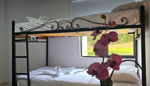 Habitación cuádruple, varias camas