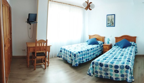 Habitación con 2 camas individuales