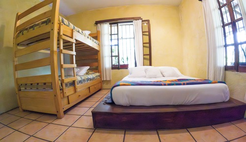 Habitación cuádruple Confort, vistas al jardín