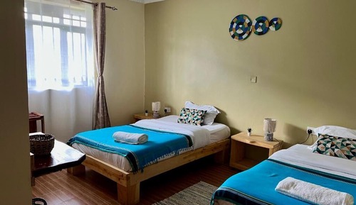 Habitación superior con 1 cama doble o 2 individuales