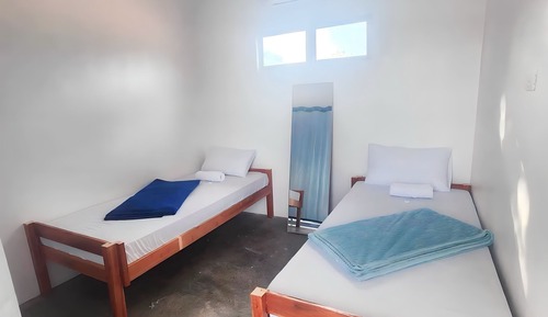 Habitación con 2 camas individuales