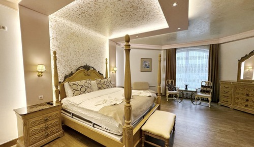 Habitación cuádruple Premium, 1 cama de matrimonio grande, vistas al jardín