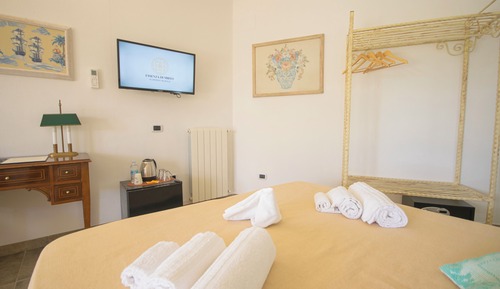 Habitación triple Deluxe, vistas parciales al mar