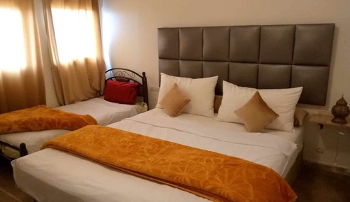 Habitación estándar con 1 cama doble o 2 individuales