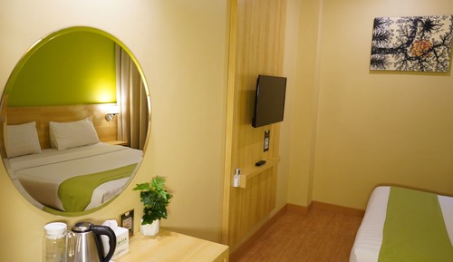 Habitación superior con 1 cama doble o 2 individuales