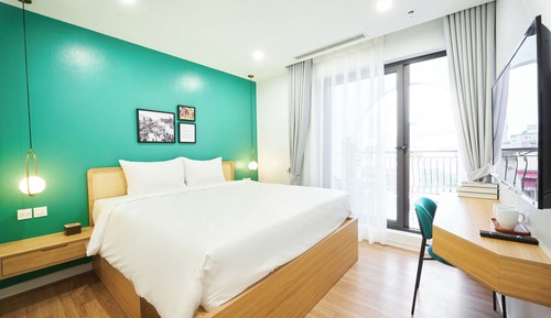 Habitación ejecutiva con 1 cama doble o 2 individuales, balcón, vistas a la ciudad