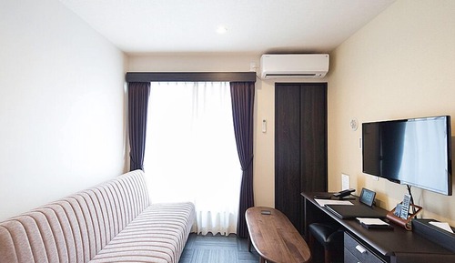 Habitación básica con 2 camas individuales