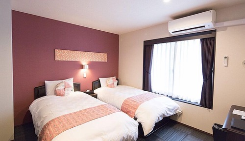 Habitación básica con 2 camas individuales