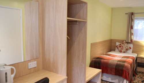 Habitación Confort con 1 cama doble o 2 individuales