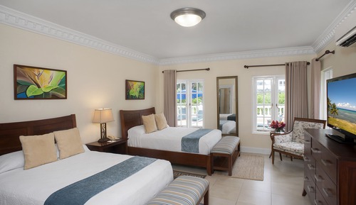 Habitación, varias camas, vistas al jardín