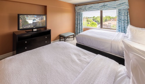 Suite estándar, vistas a la ciudad (2 Double Beds and 1 Sofa Bed)