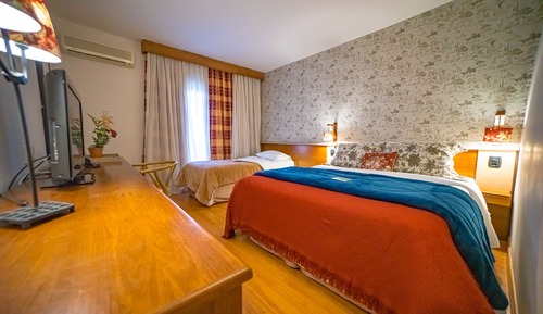 Habitación triple Deluxe