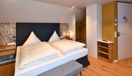 Suite, en una planta alta