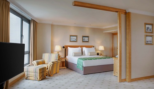 Suite junior, 1 cama de matrimonio grande, fumadores, vistas a la ciudad