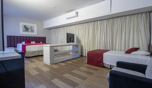 Habitación triple familiar, varias camas