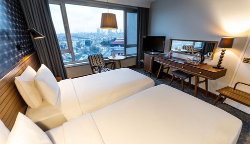 Habitación superior, vistas a la ciudad
