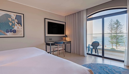 Habitación superior, varias camas, vistas al mar
